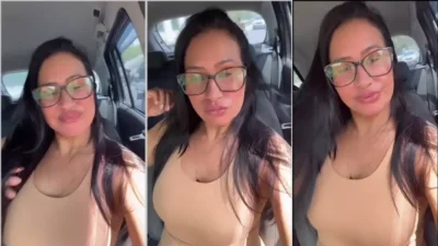 Alessandra Marques in the car filming