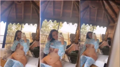 Lioquen raised the blouse and lowered the pants to show everything