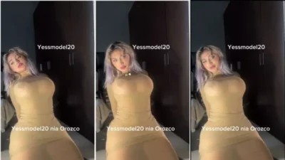 Nia orozco in dress jumping on the bed